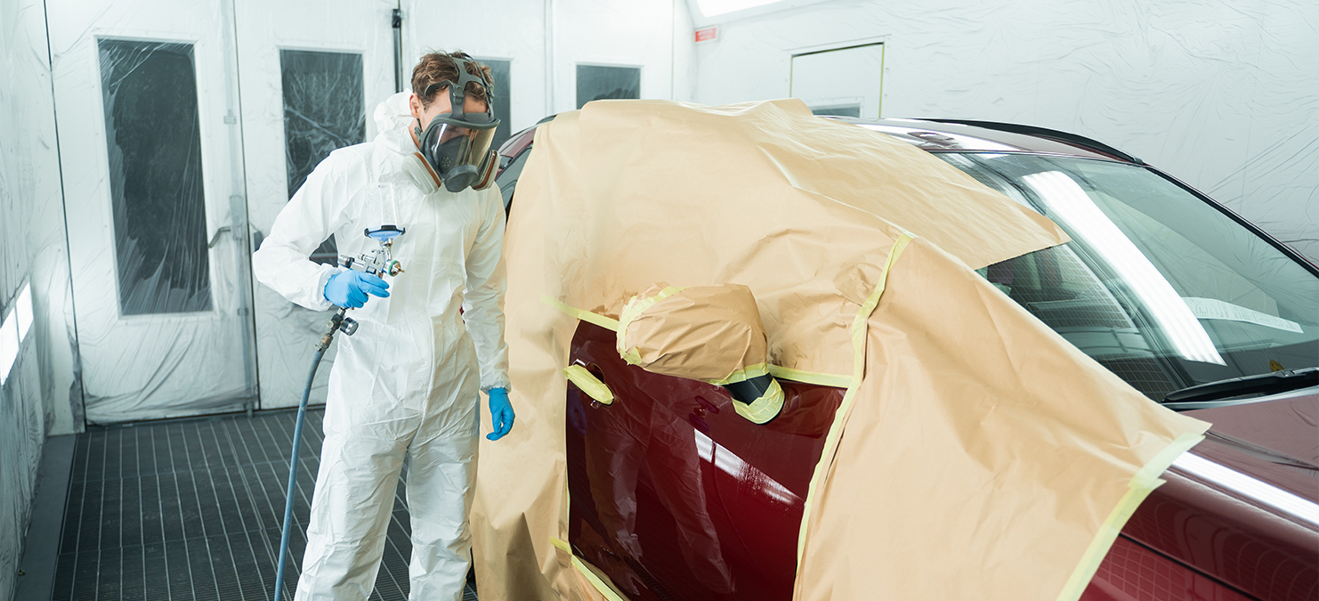 Automotive painting using a respirator